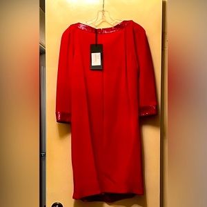 Andrew GN red dress